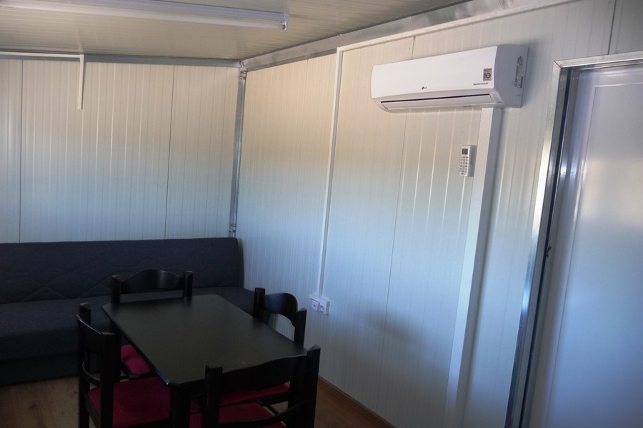 prefabricated house inside view livingroom AC